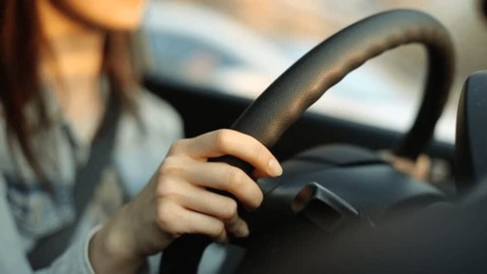 Close-up of a driver enjoying a smooth ride in a Skoda car