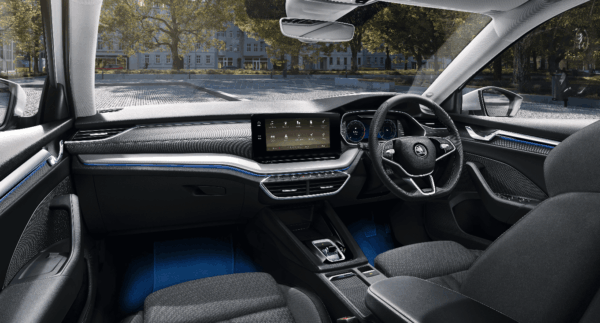 Interior view of the Škoda Octavia, featuring a digital cockpit, large central touchscreen, and modern dashboard design